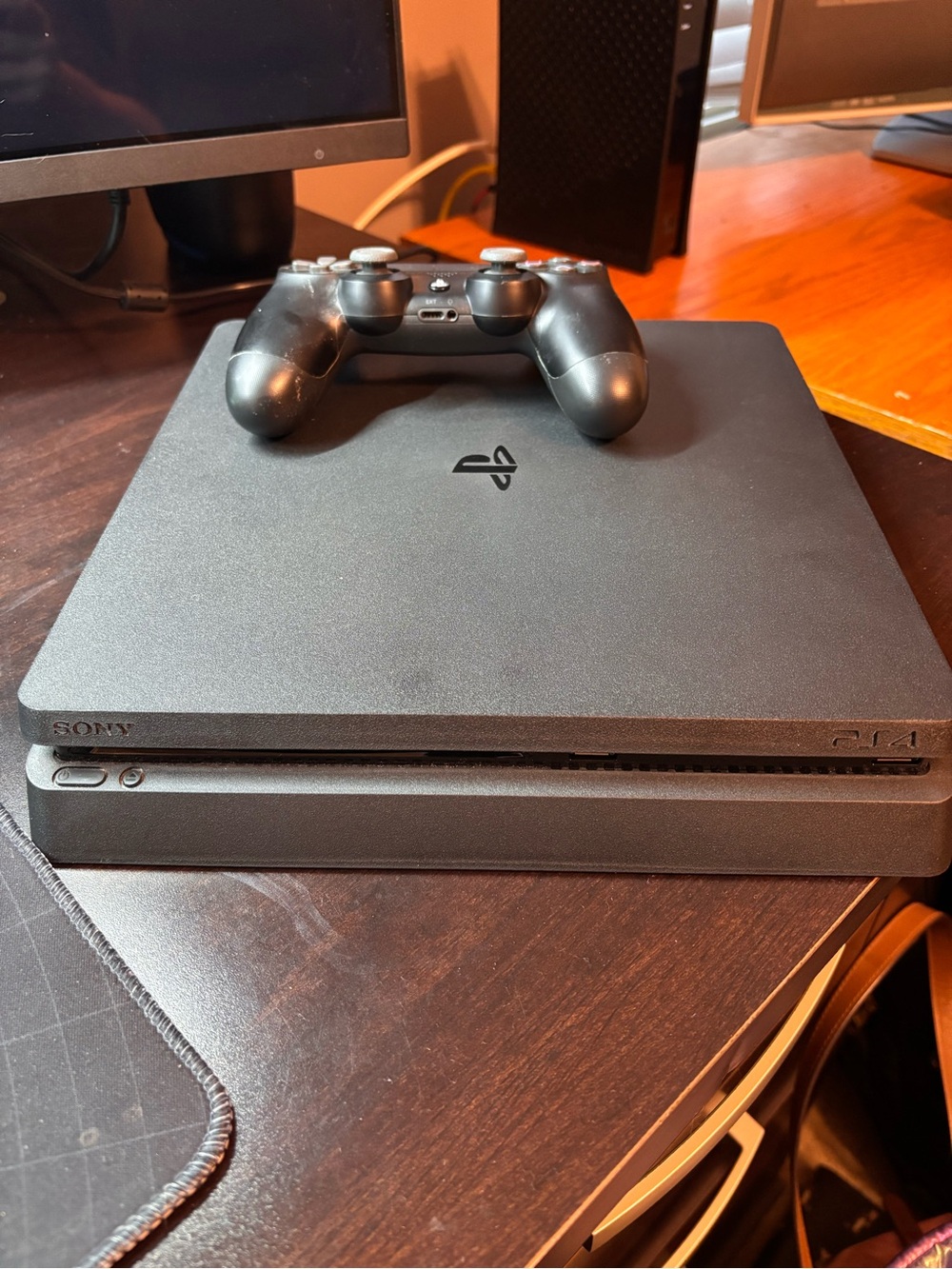 Sony PS4 Slim Console with Black Wireless Controller - Black
